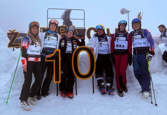 SanaClis team in front of Zampa Cup sign